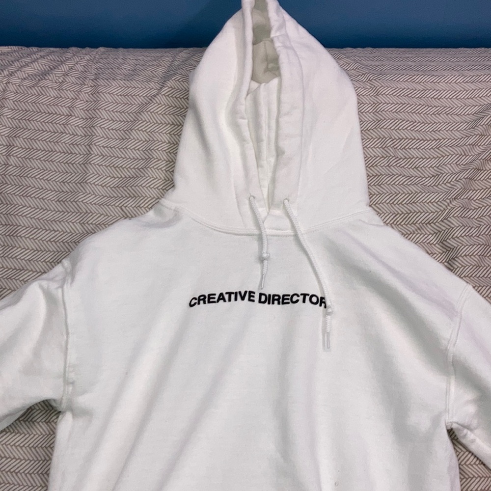 New white “creative director” hoodie (never worn)